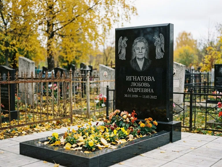 Памятник с гравировкой ангела — гравировка двух ангелов по сторонам портрета, работа «Игнатова» в Тюмени
