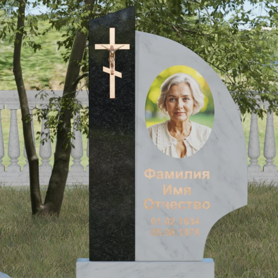 Памятник — крыло с распятием и шарами, мрамор Тассос, в Якутске